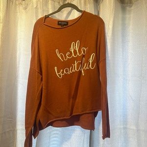 Kittenish “Hello Beautiful” Sweater